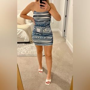 Et clet blue and white swirl body con dress with beautiful back detail